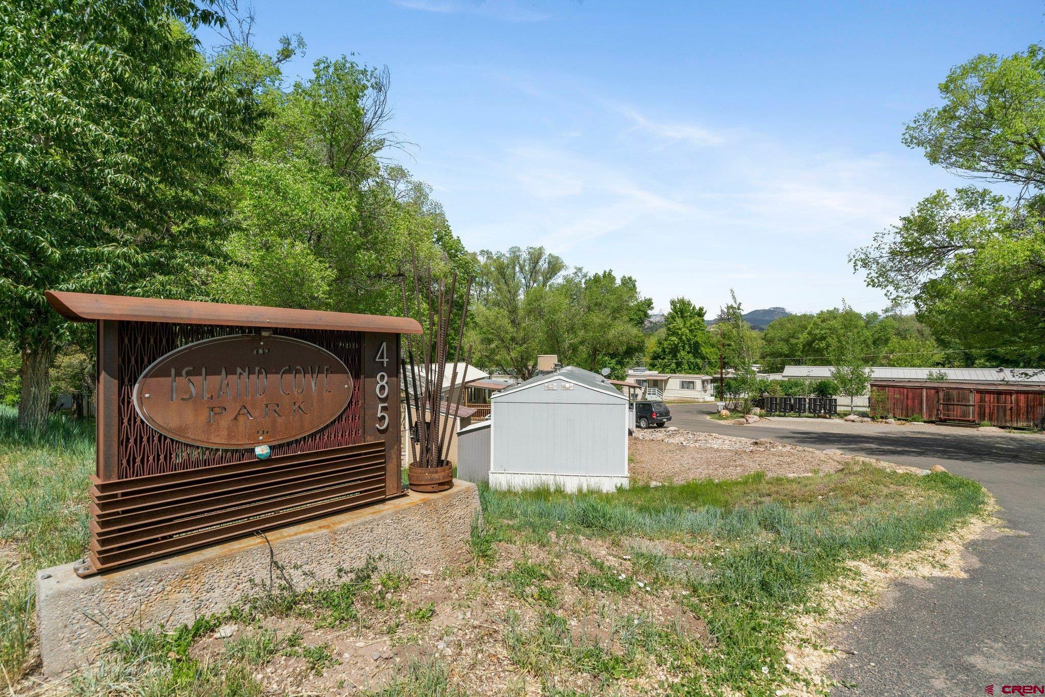 485 Florida Road, Unit D6 Durango, CO 81301 - Photo 32 of 35 a backyard of a house with table and chairs