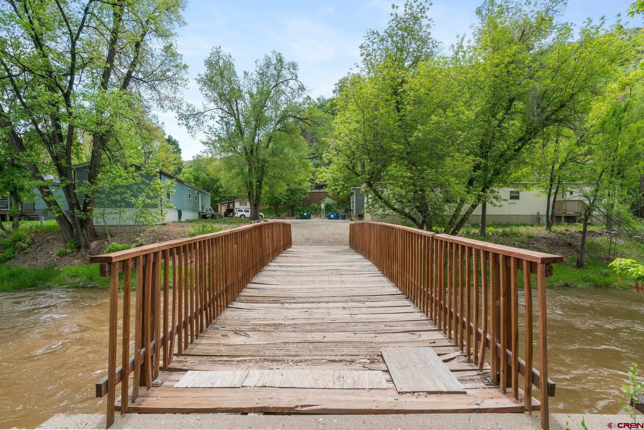 485 Florida Road, Unit D6 Durango, CO 81301 - Photo 33 of 35 a view of balcony with wooden floor and fence