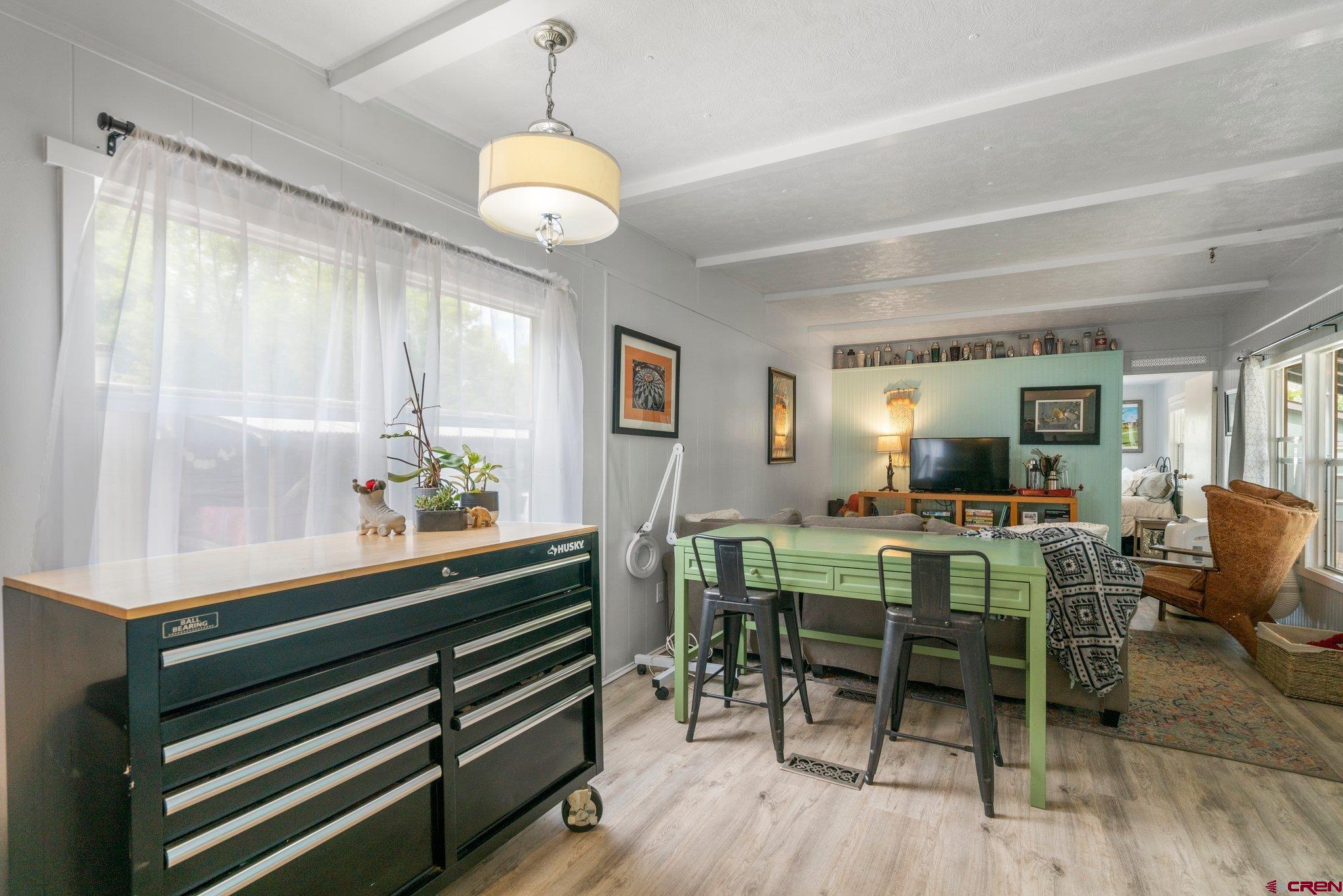 485 Florida Road, Unit D6 Durango, CO 81301 - Photo 8 of 35 a view of a dining room with furniture and window