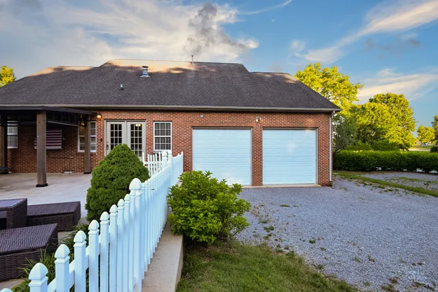 a view of swimming pool with a patio