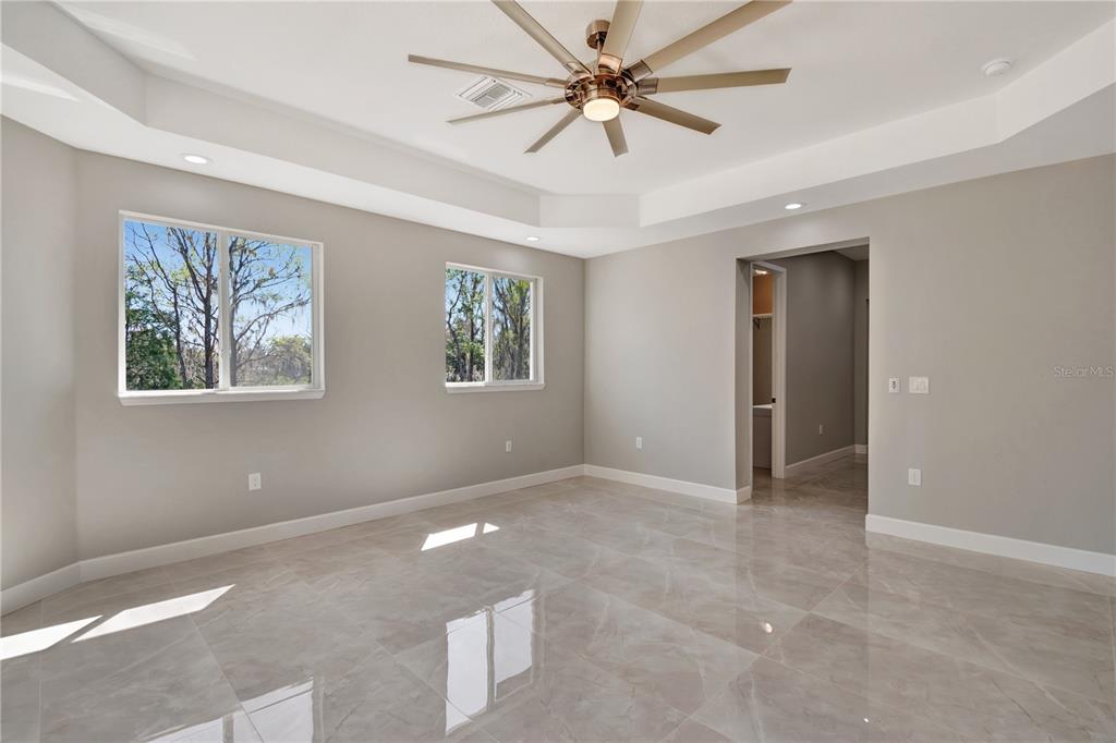4869 Northwest 101st St Road Ocala, FL 34482 - Photo 19 of 48 Master bedroom