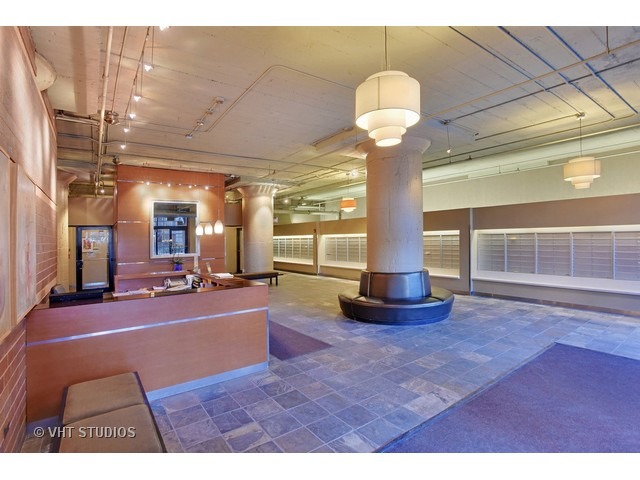 1530 South State Street, Unit 612 Chicago, IL 60605 - Photo 2 of 25 a view of a room with gym equipment