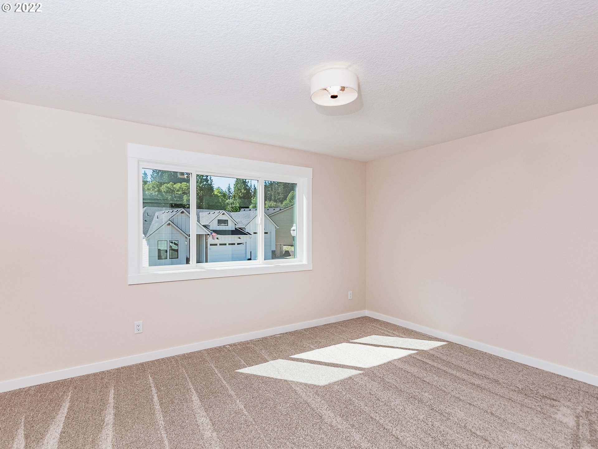 2217 South Royal Court Ridgefield, WA 98642 - Photo 20 of 26 an empty room with a window