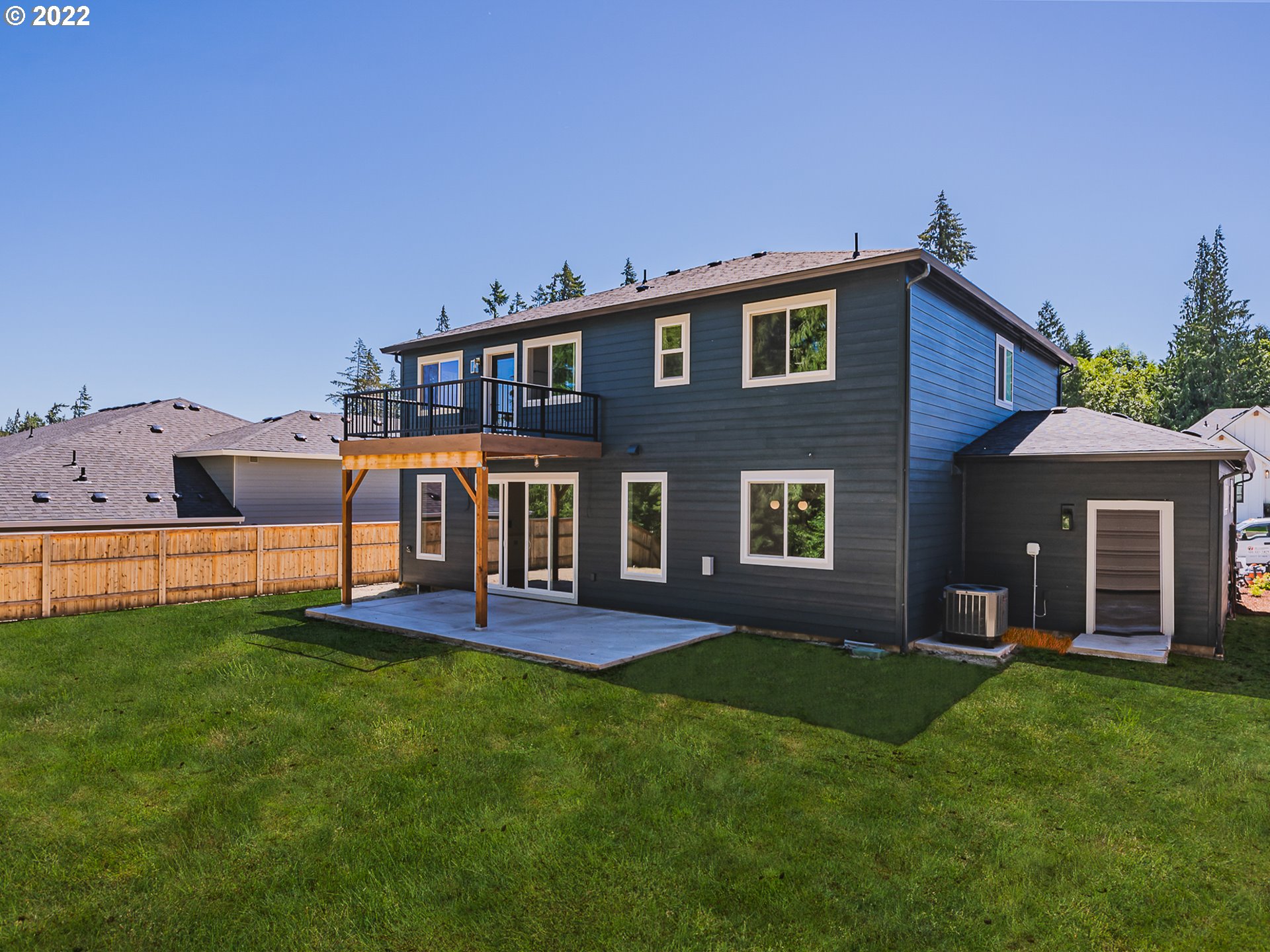 2217 South Royal Court Ridgefield, WA 98642 - Photo 26 of 26 a view of a house with a yard and table