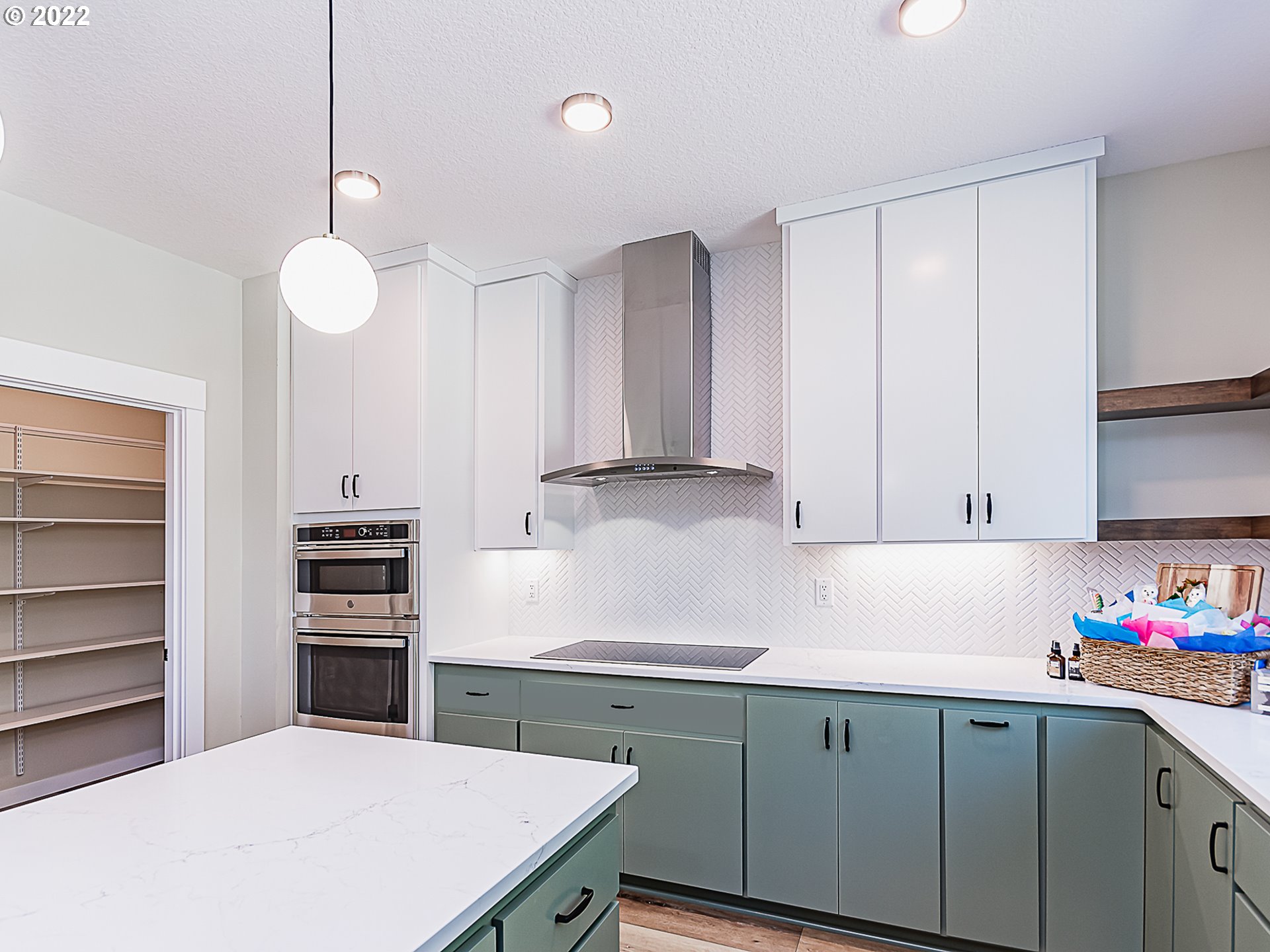 2217 South Royal Court Ridgefield, WA 98642 - Photo 5 of 26 a kitchen with a sink cabinets and appliances