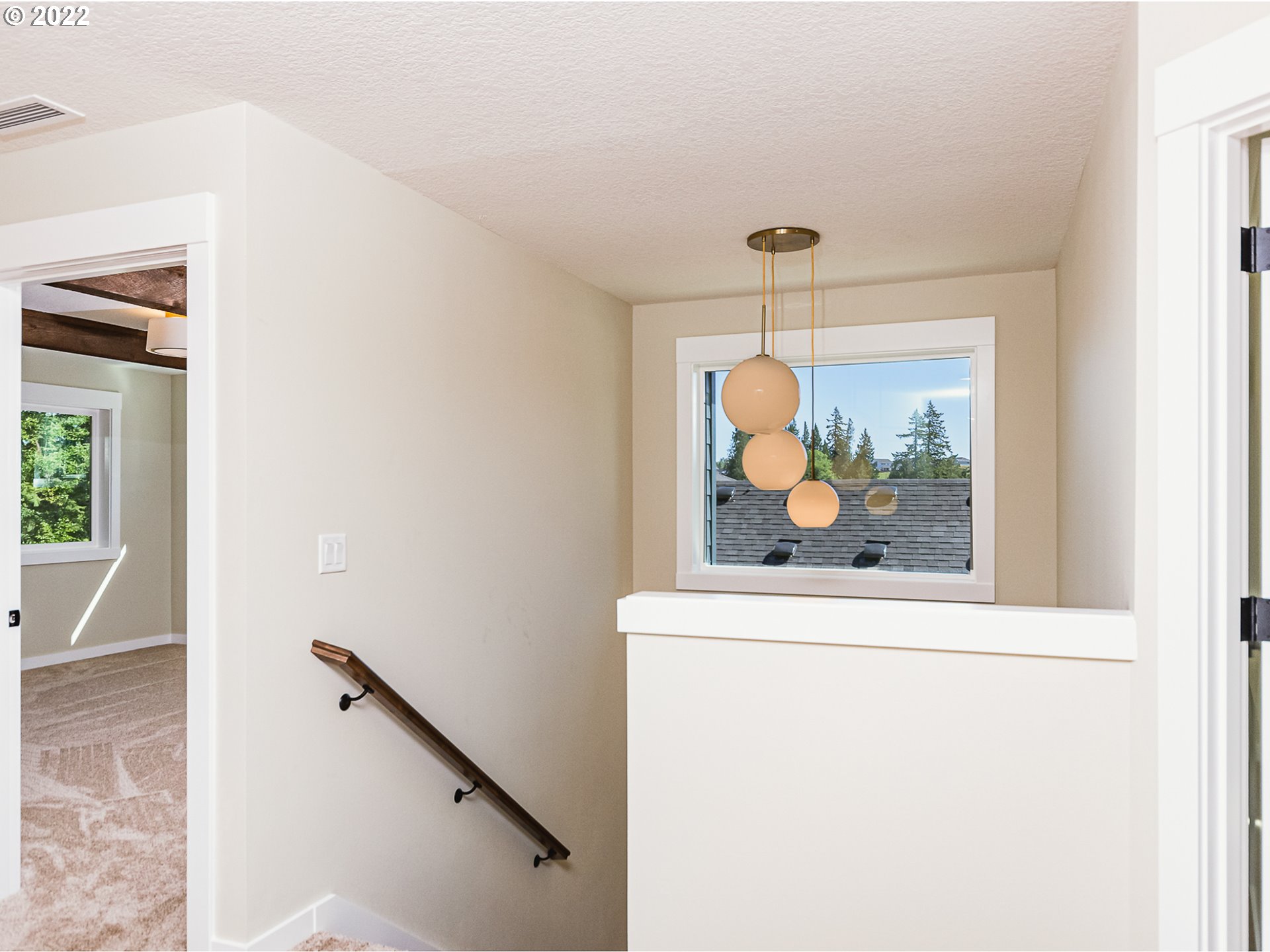 2217 South Royal Court Ridgefield, WA 98642 - Photo 8 of 26 a picture of a hallway