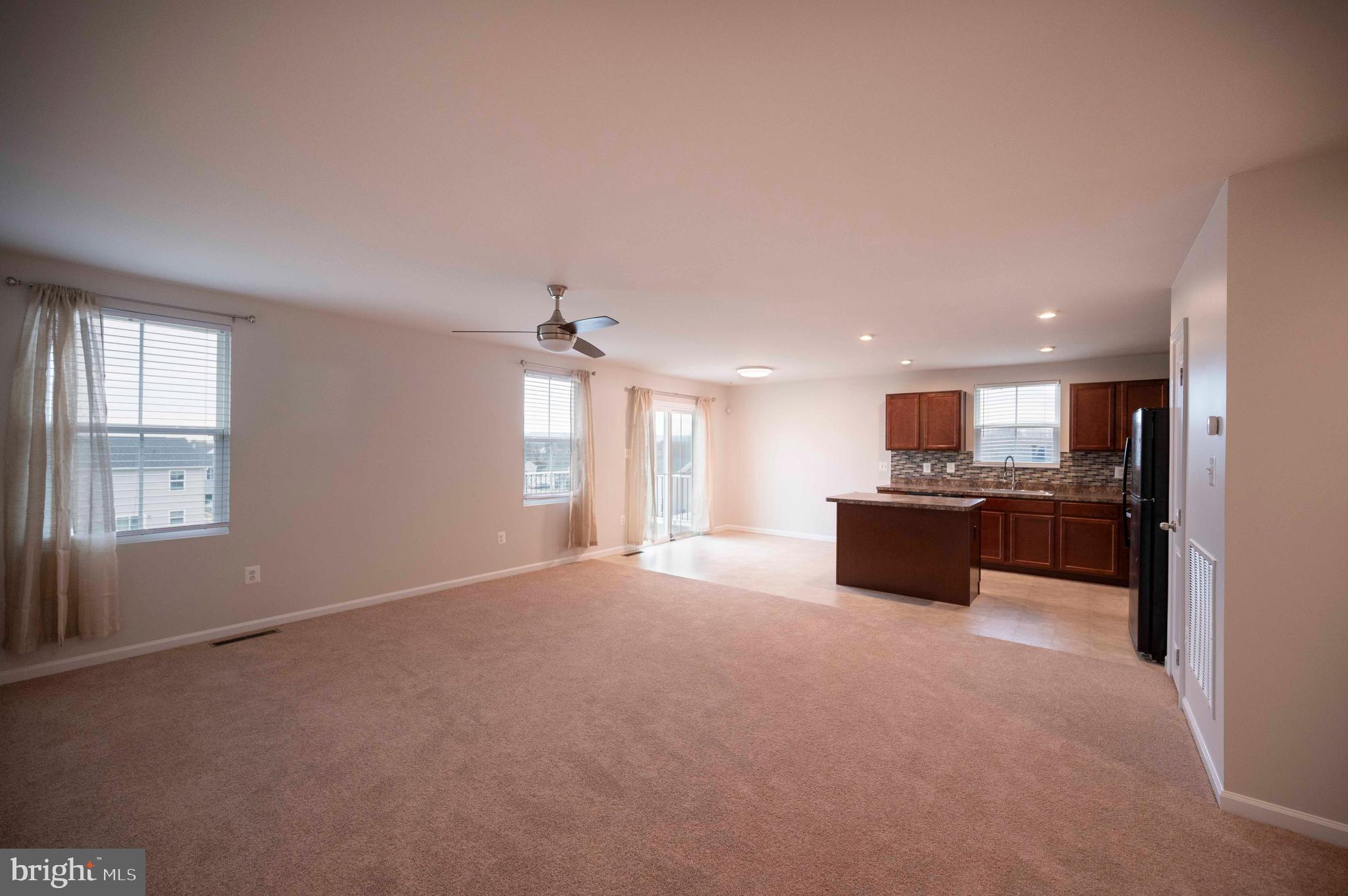 151 Cougill Road Middletown, VA 22645 - Photo 22 of 41 a big room with chandelier and windows