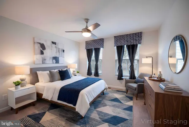 a bathroom with a toilet a sink a mirror and a bathtub