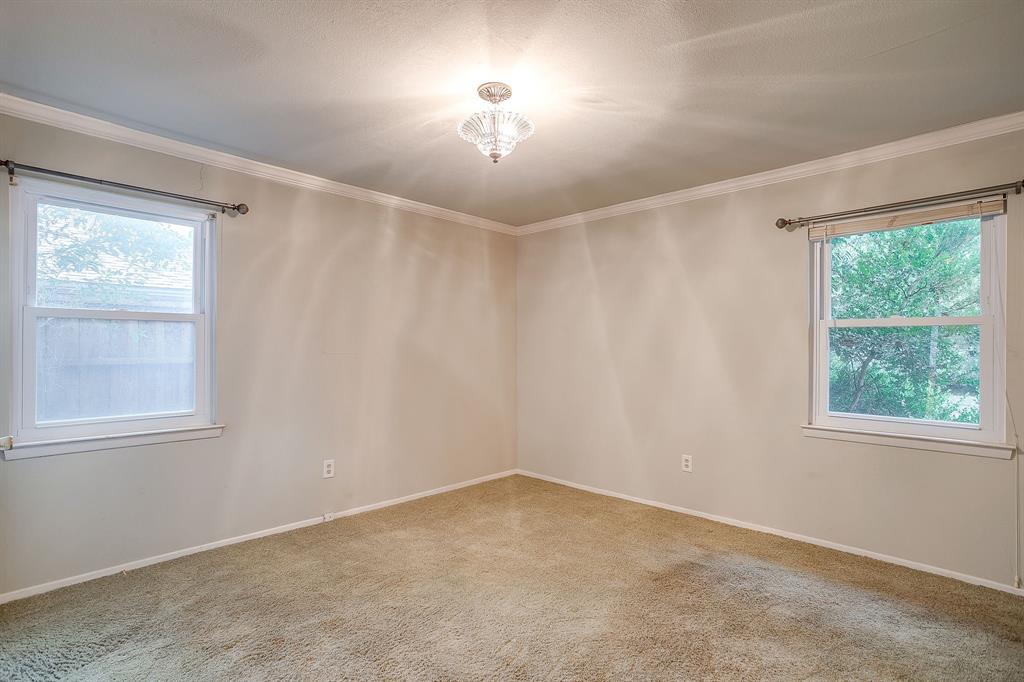 856 Broadway Avenue Euless, TX 76040 - Photo 18 of 35 an empty room with windows