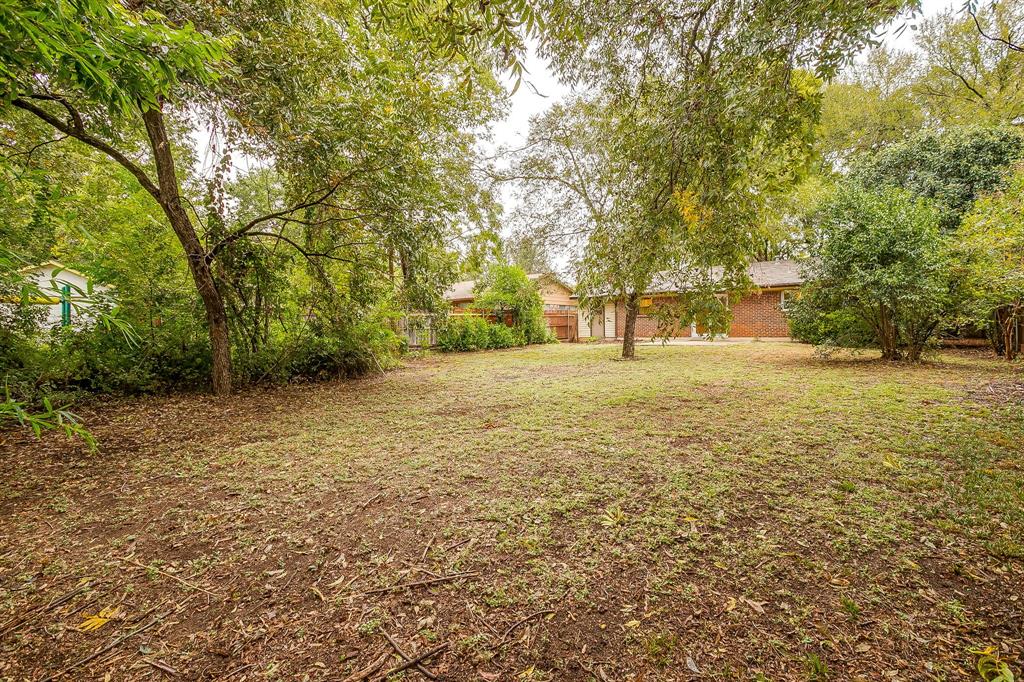 856 Broadway Avenue Euless, TX 76040 - Photo 31 of 35 a view of yard with trees
