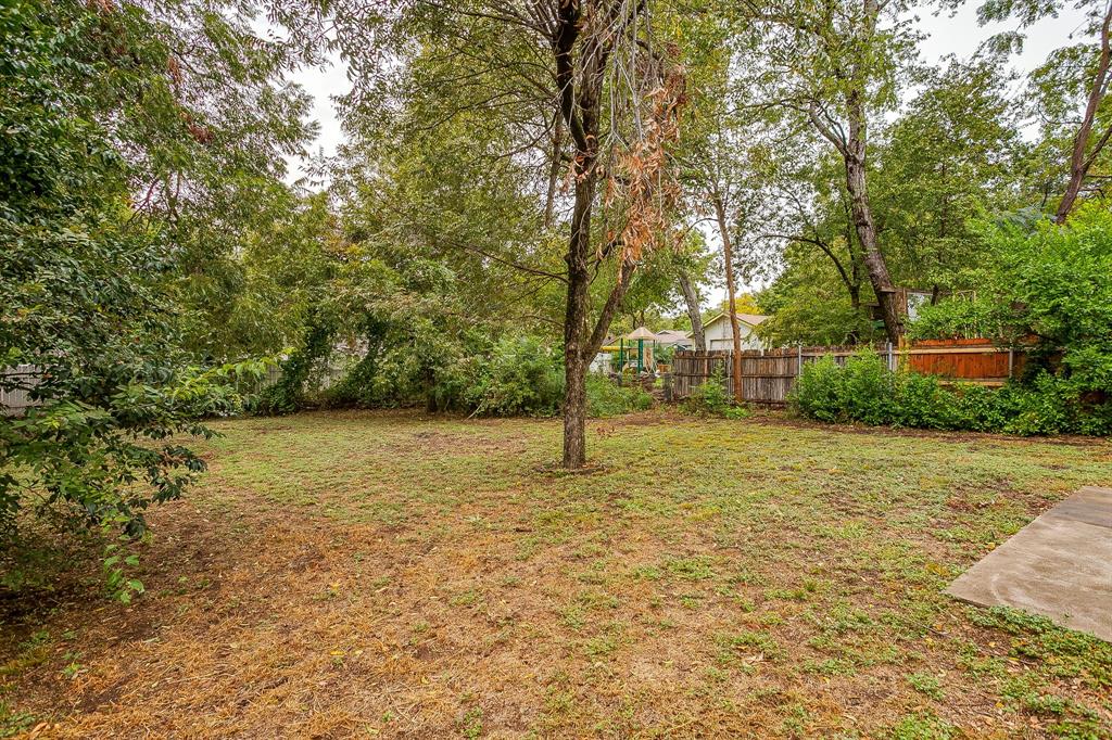 856 Broadway Avenue Euless, TX 76040 - Photo 35 of 35 a view of a yard with trees
