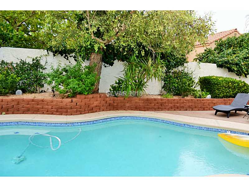 77 Westheimer Road Henderson, NV 89074 - Photo 14 of 35 Exterior Back. Pool