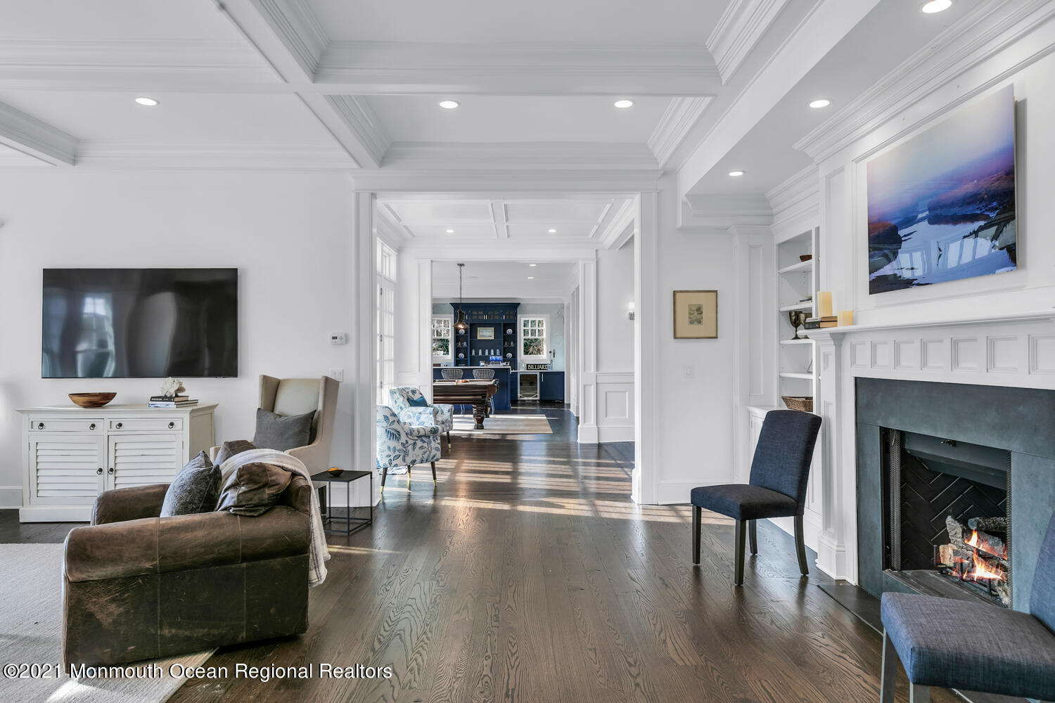83 Rumson Road Rumson, NJ 07760 - Photo 14 of 56 a living room with furniture a flat screen tv and a fireplace
