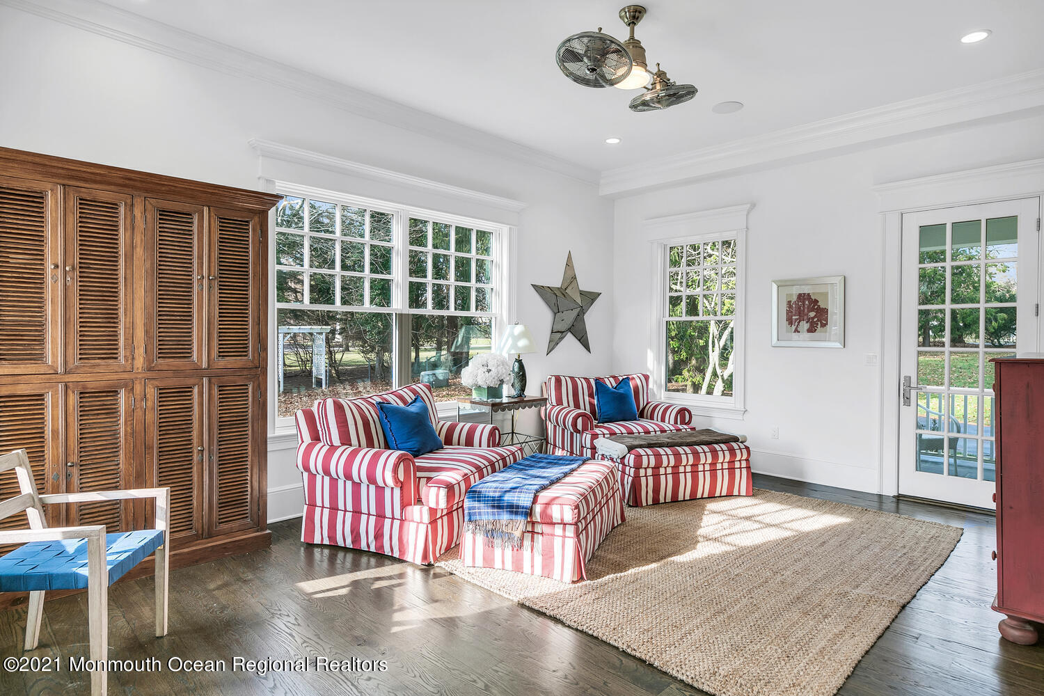 83 Rumson Road Rumson, NJ 07760 - Photo 18 of 56 a living room with furniture and large windows