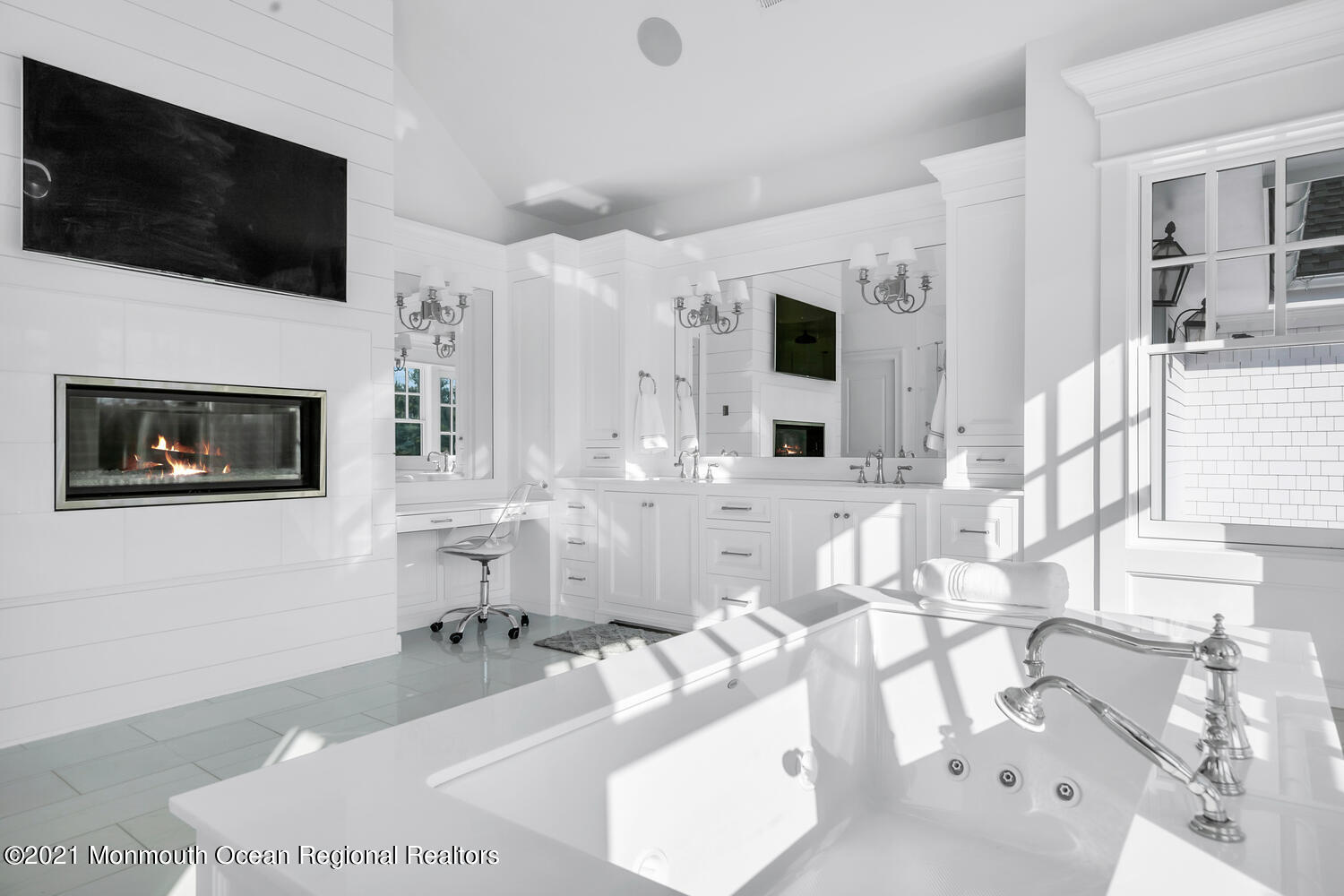 83 Rumson Road Rumson, NJ 07760 - Photo 26 of 56 a living room with furniture and a flat screen tv