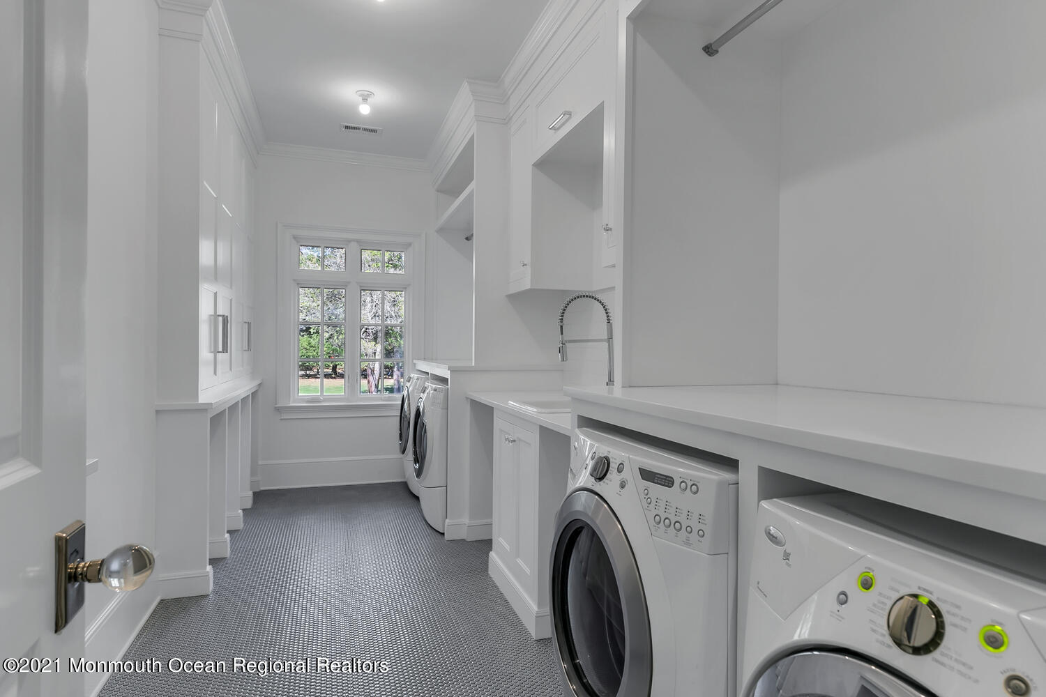 83 Rumson Road Rumson, NJ 07760 - Photo 42 of 56 a view of storage and utility room with washer and dryer