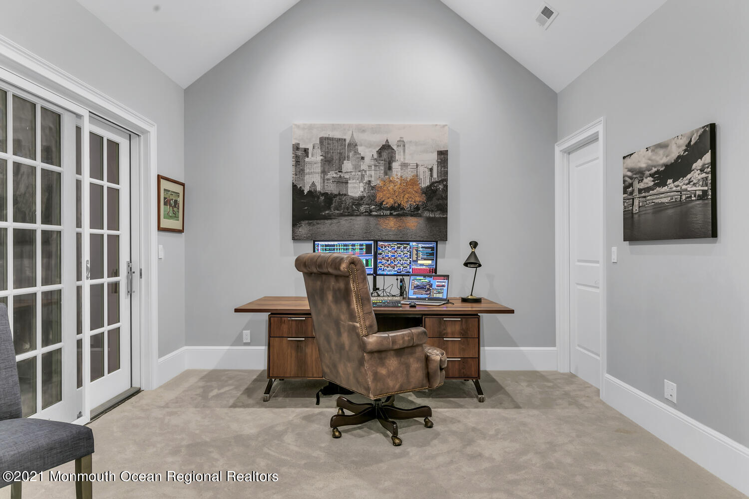 83 Rumson Road Rumson, NJ 07760 - Photo 43 of 56 a view of a workspace with furniture and a window