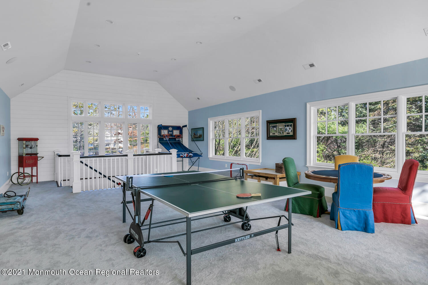 83 Rumson Road Rumson, NJ 07760 - Photo 46 of 56 a living room with furniture a table and large windows