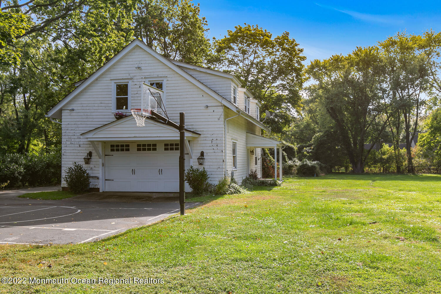 83 Rumson Road Rumson, NJ 07760 - Photo 55 of 56 a front view of a house with a yard