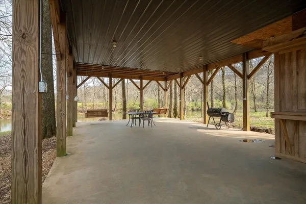 a view of an empty room with a large window