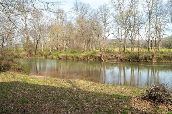 a view of a lake from a balcony