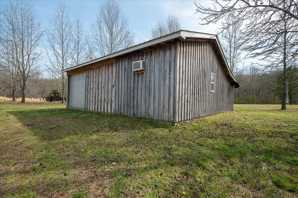 a kitchen with a refrigerator and a stove