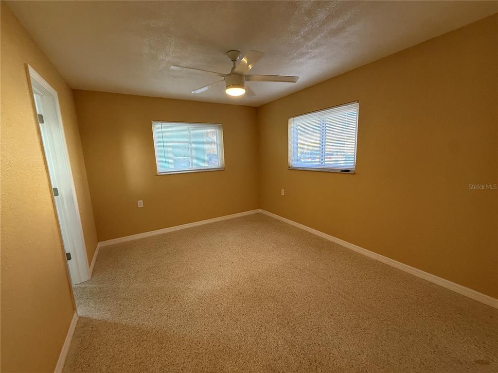 17688 Gulf Boulevard, Unit 104 Redington Shores, FL 33708 - Photo 4 of 15 a view of an empty room with a window