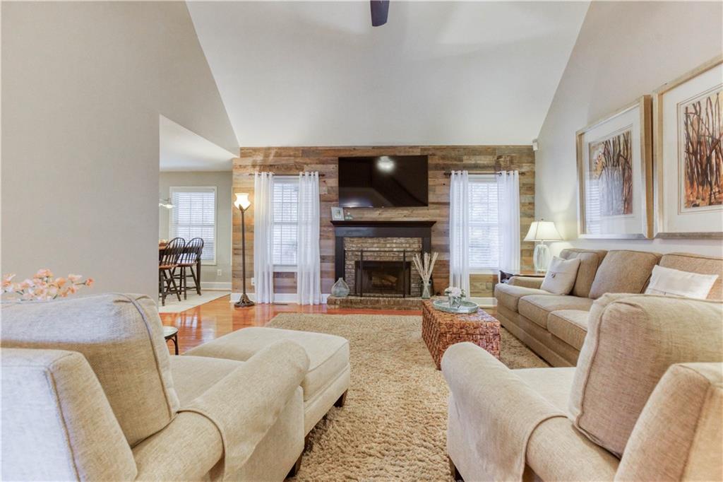 2521 Culpepper Trail Southeast Bethlehem, GA 30620 - Photo 28 of 83 a living room with furniture and a fireplace