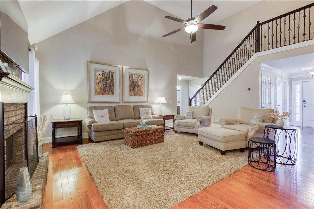 2521 Culpepper Trail Southeast Bethlehem, GA 30620 - Photo 29 of 83 a living room with furniture and a fireplace