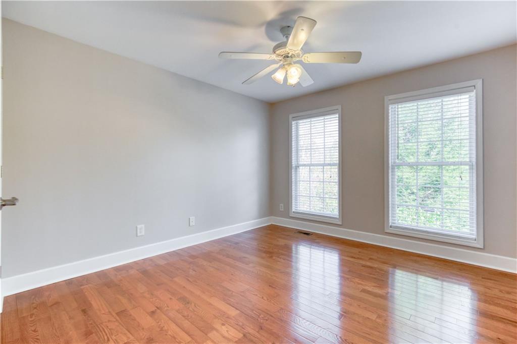 2521 Culpepper Trail Southeast Bethlehem, GA 30620 - Photo 48 of 83 an empty room with wooden floor and windows