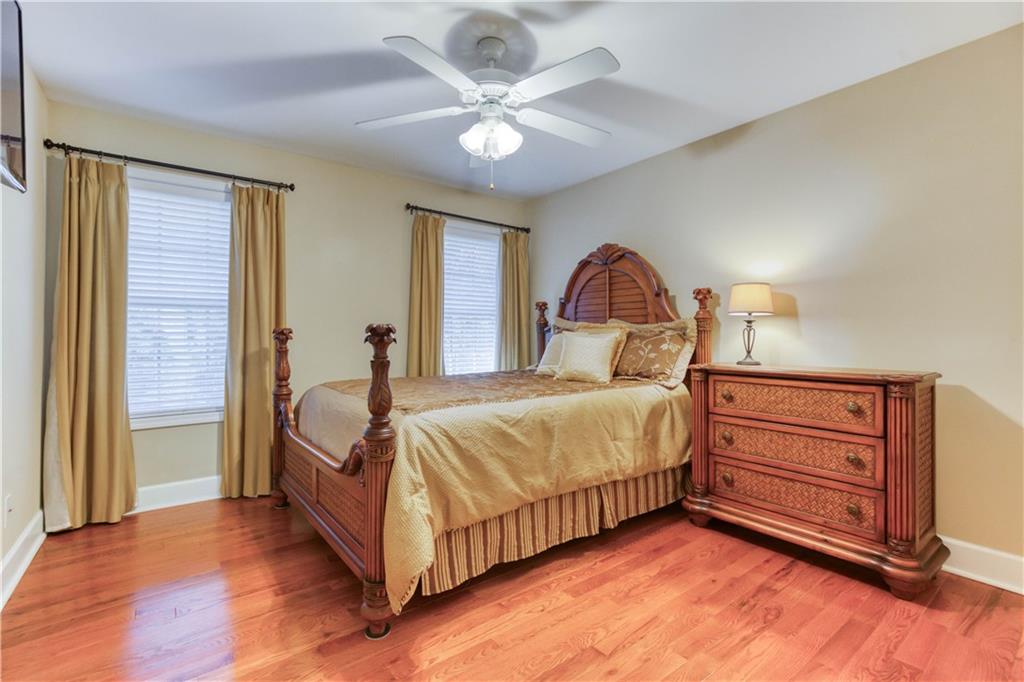 2521 Culpepper Trail Southeast Bethlehem, GA 30620 - Photo 51 of 83 a bedroom with a bed and a large window