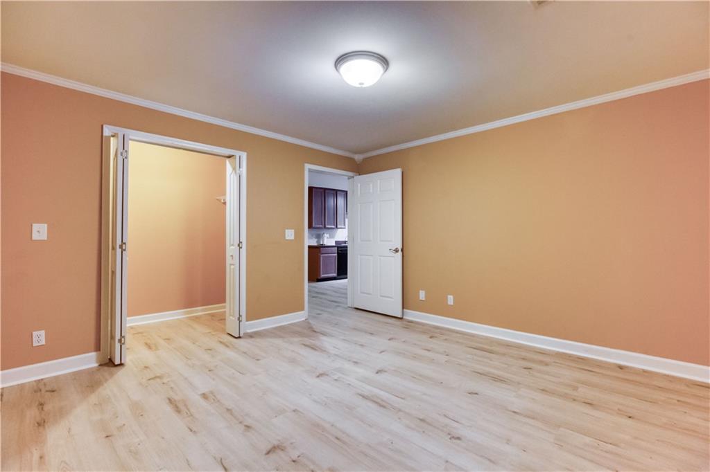 2521 Culpepper Trail Southeast Bethlehem, GA 30620 - Photo 69 of 83 wooden floor in an empty room with a window