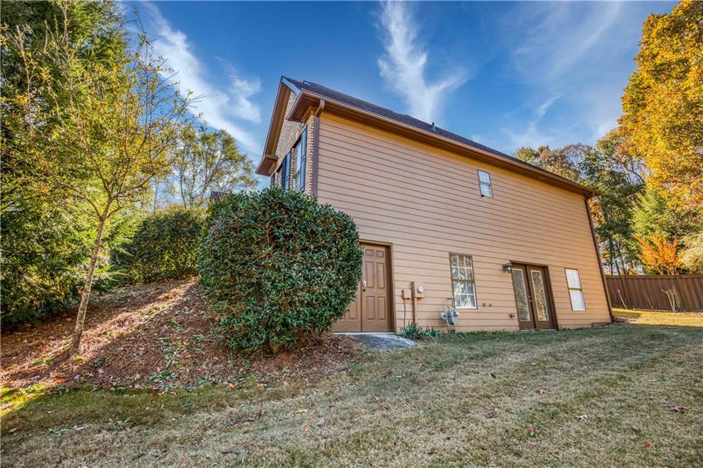 2521 Culpepper Trail Southeast Bethlehem, GA 30620 - Photo 10 of 83 front view of a house with a yard