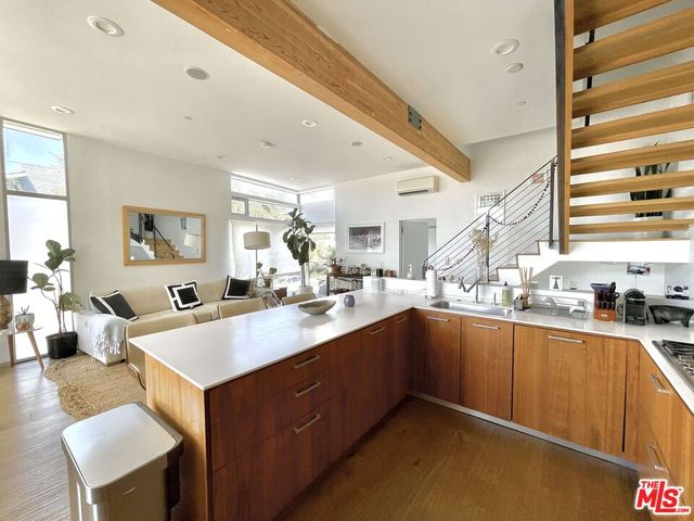 a view of a kitchen counter top space with stainless steel appliances granite countertop lots of counter top space
