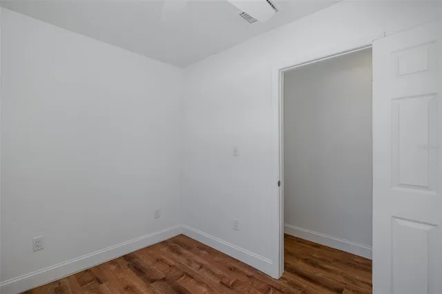 a view of a backyard with sitting area