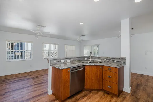 a bathroom with a shower and a sink