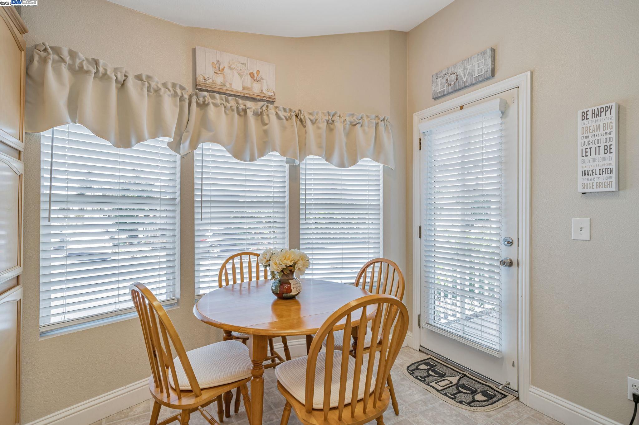 3263 Vineyard, Unit 68 Pleasanton, CA 94566 - Photo 13 of 41 a view of a chair and table in the patio