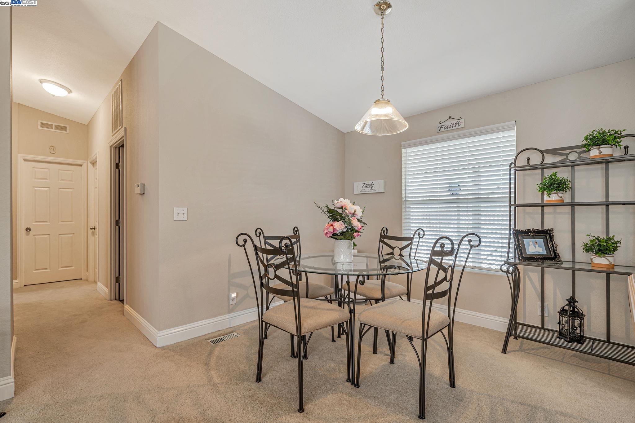 3263 Vineyard, Unit 68 Pleasanton, CA 94566 - Photo 15 of 41 a dining room with furniture and window
