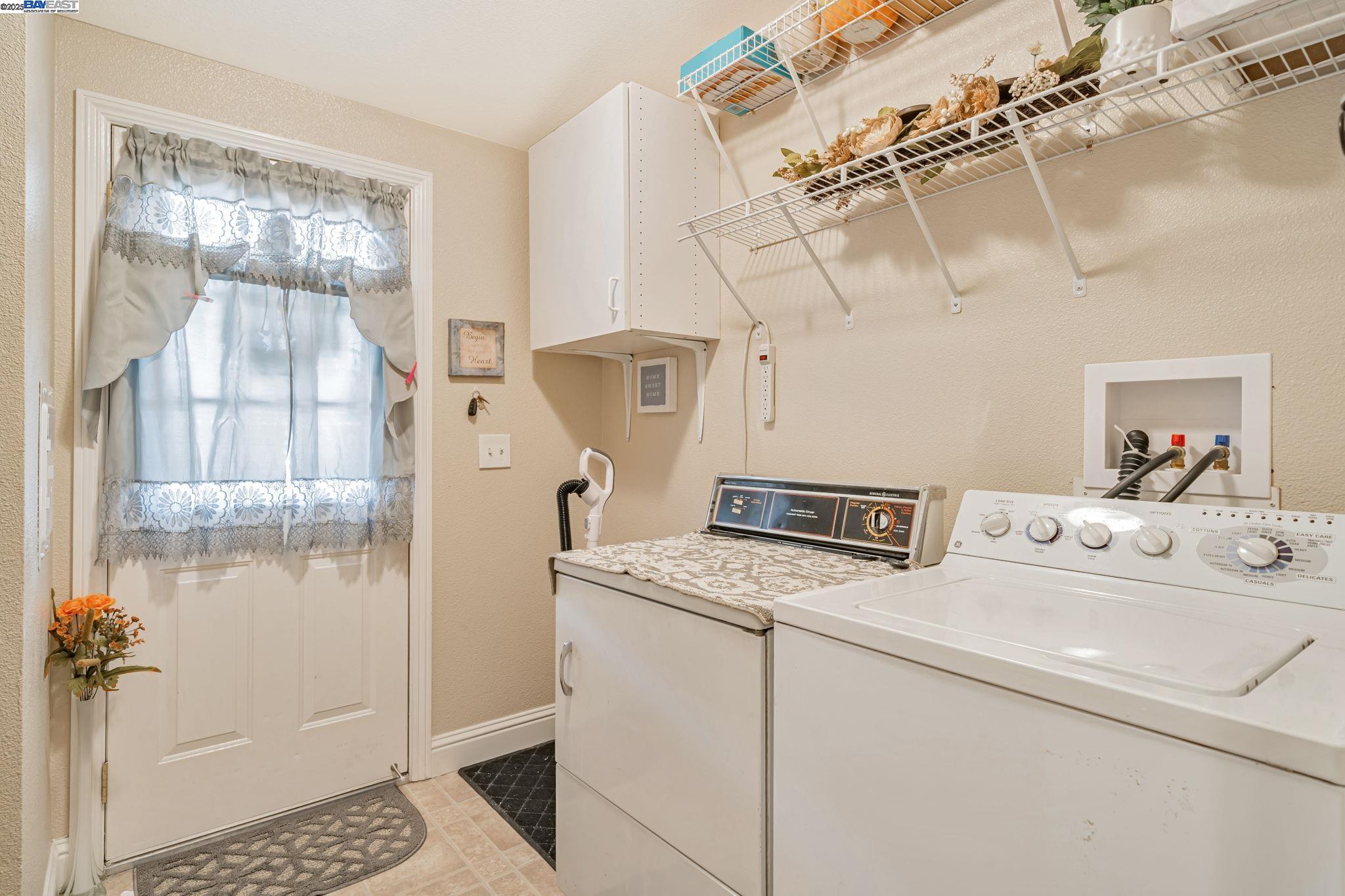 3263 Vineyard, Unit 68 Pleasanton, CA 94566 - Photo 33 of 41 a utility room with dryer and washer