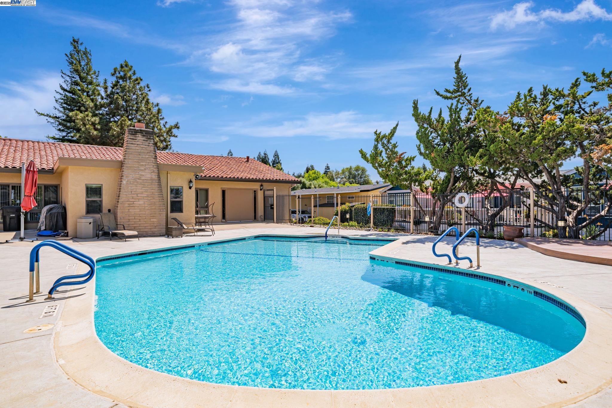 3263 Vineyard, Unit 68 Pleasanton, CA 94566 - Photo 40 of 41 a view of a house with swimming pool