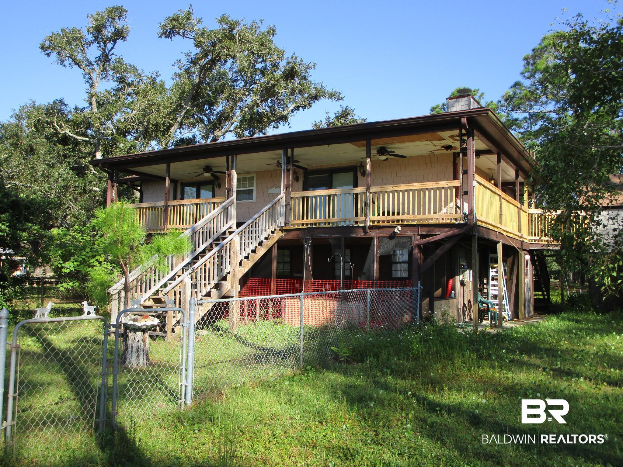645 West Fort Morgan Road Gulf Shores, AL 36542 - Photo 5 of 30 House Rear