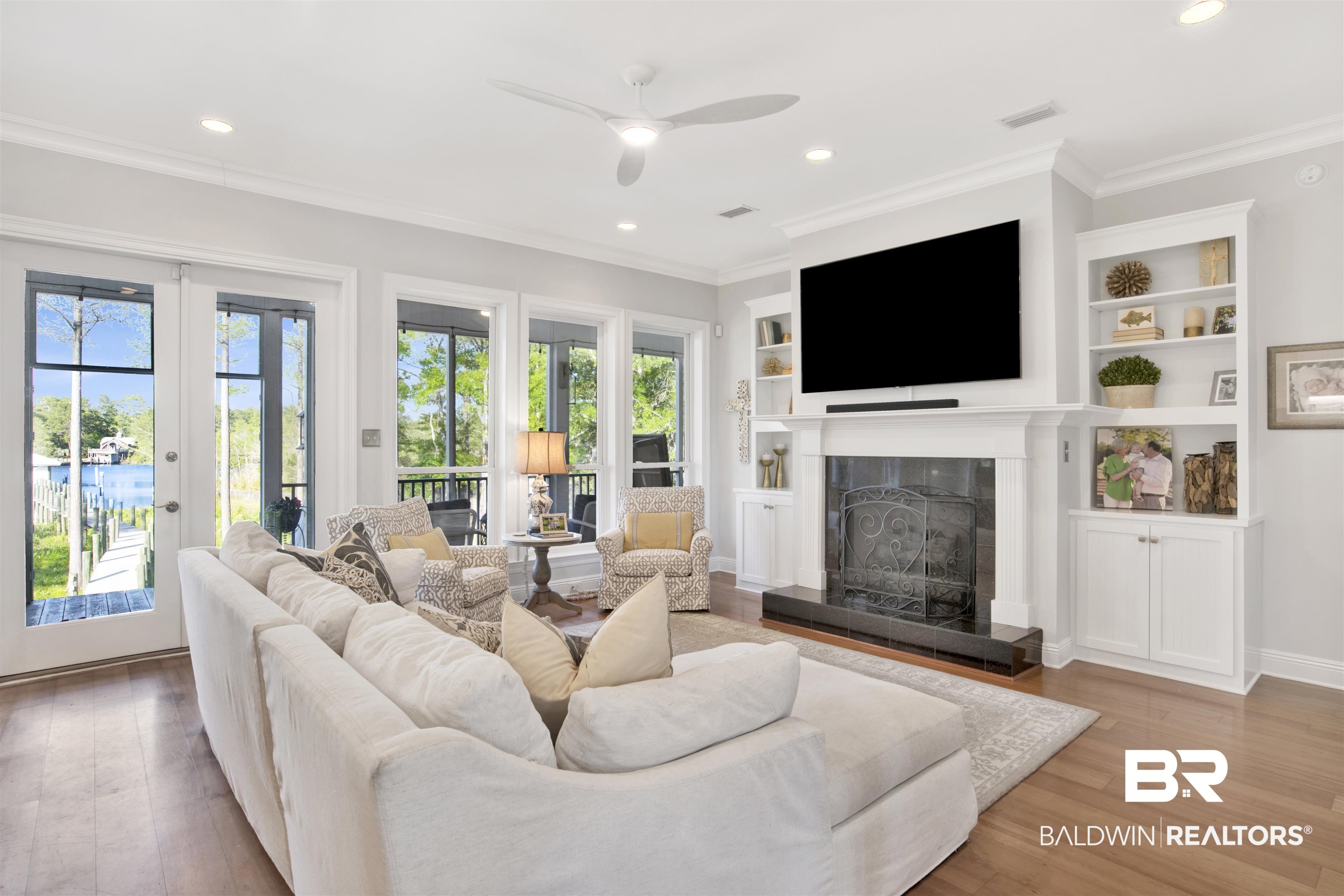 11463 Getchell Drive Theodore, AL 36582 - Photo 10 of 39 Living room with hardwood / wood-style flooring, ceiling fan, and ornamental molding