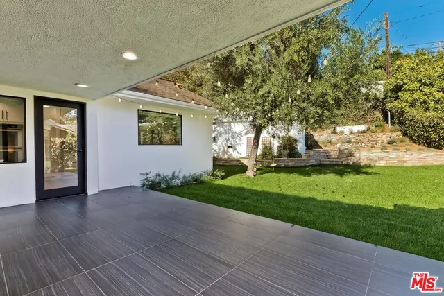 a view of a porch with a yard
