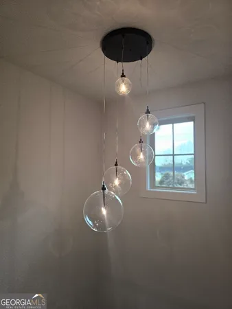 a view of a hallway with windows