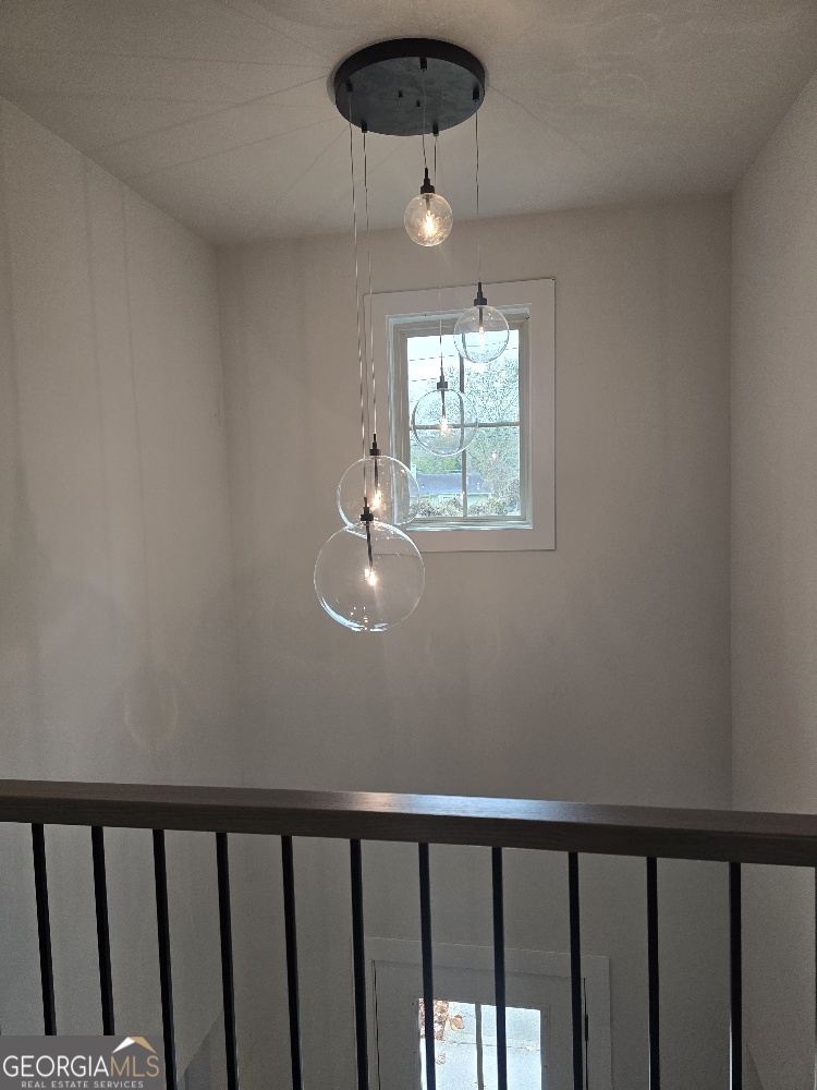 128 Patillo Manor, Unit 7 Stockbridge, GA 30281 - Photo 21 of 37 a view of a hallway with windows