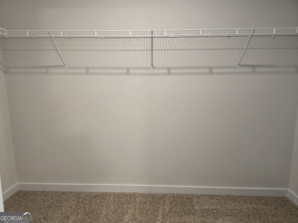 128 Patillo Manor, Unit 7 Stockbridge, GA 30281 - Photo 31 of 37 a view of a closet