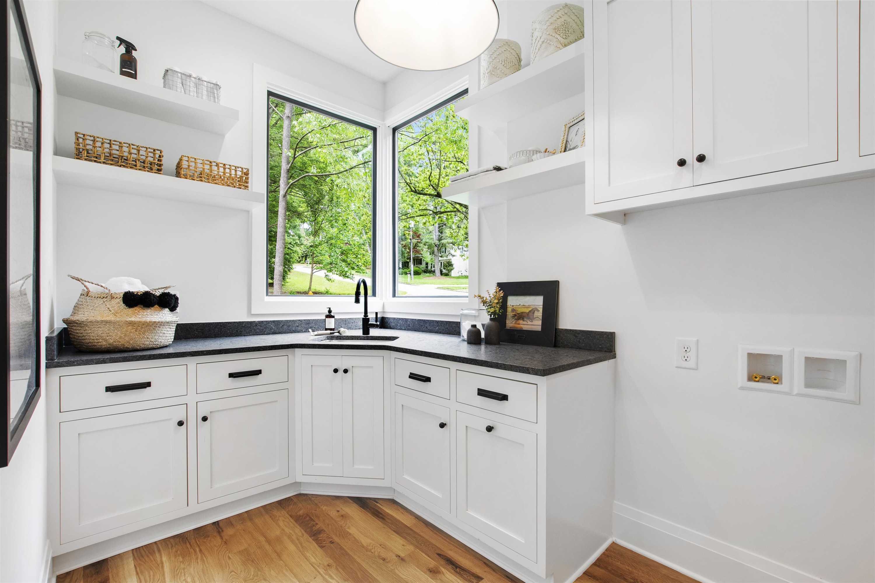 3340 Hampton Road Raleigh, NC 27607 - Photo 39 of 66 Who wouldn't want to do laundry in this room? Laundry Room