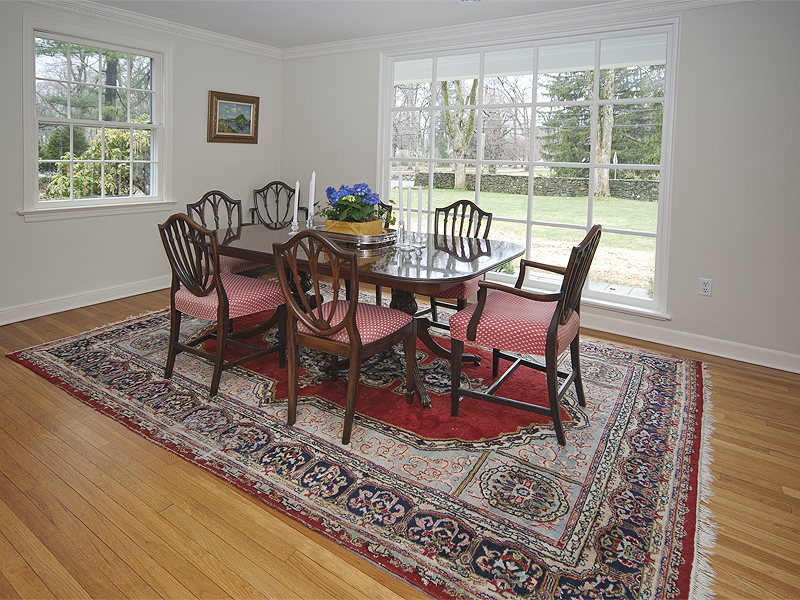 159 Oenoke Ridge New Canaan, CT 06840 - Photo 13 of 28 a view of a dining room with furniture window and outside view