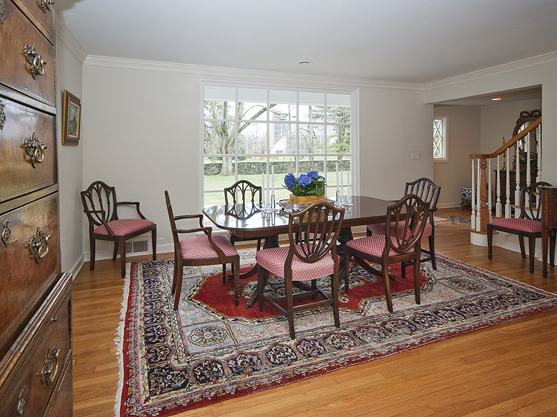 159 Oenoke Ridge New Canaan, CT 06840 - Photo 14 of 28 a view of a dining room with furniture window and wooden floor