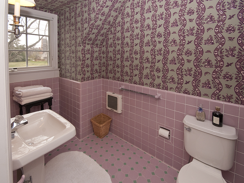 159 Oenoke Ridge New Canaan, CT 06840 - Photo 24 of 28 a bathroom with a toilet a sink and mirror
